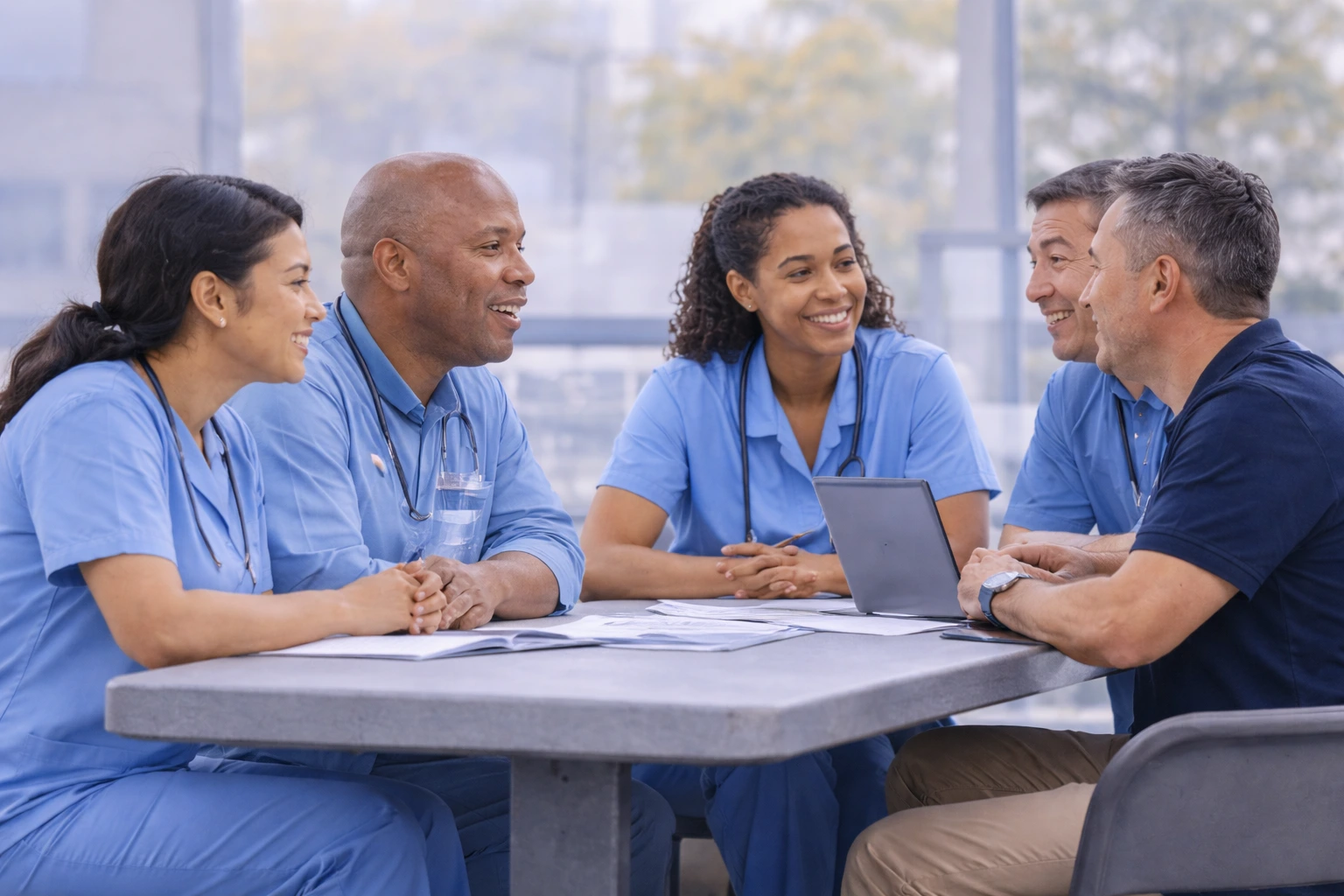 Healthcare team reviewing treatment details together